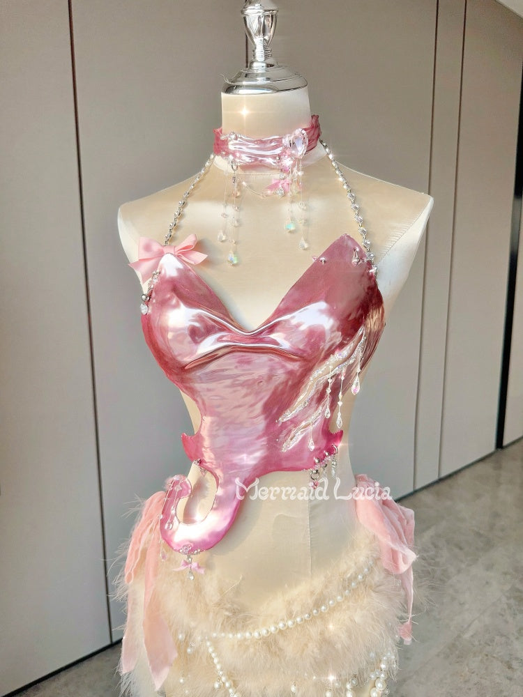 Aurora Embraces Pink Phantom Resin Top Costume Patent-Protected